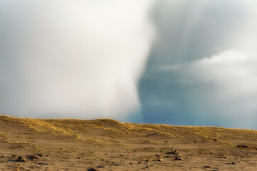 Clouds over coastal dunes