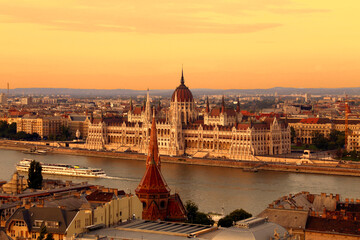 Bright sunset over famous landmarks at Hungalian Parliament Budapest © Sblazquez