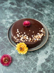 Chocolate cake with yellow flower