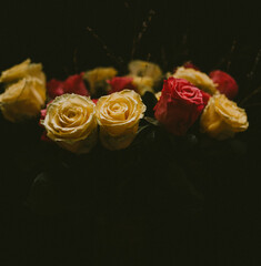 Bunch of yellow and pink roses