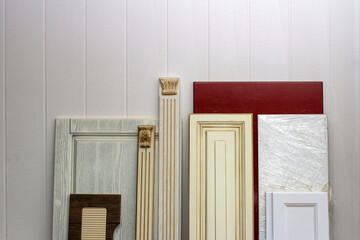samples and cuts of mdf panels in the room for the production of furniture facades
