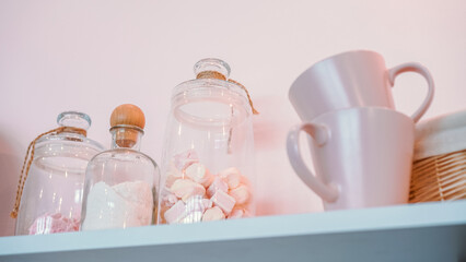 Modern kitchen wall with cookware set.