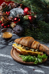 New Year's breakfast with croissants. New Year's croissant with Dor Blue cheese. New Year and Christmas concept