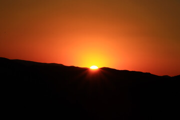 sunset over the mountains