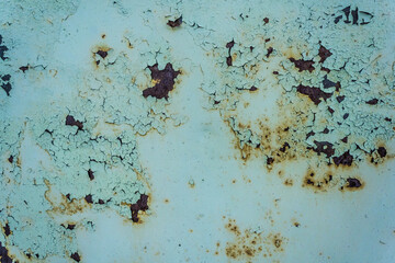 Old cracked paint on rusty iron. background texture