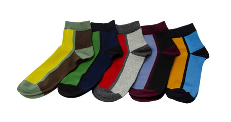 a lot of multicolored socks laid out and isolated on a white background