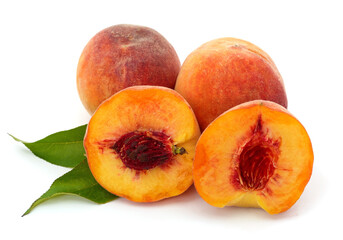 Sliced peach and leaves.