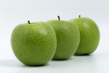 Green apple on white background