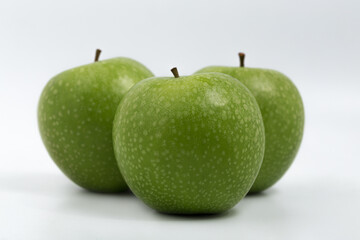 Green apple on white background
