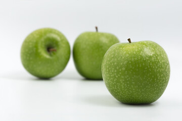 Green apple on white background