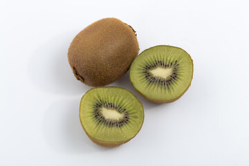 Green kiwi on white background © Veronica Glez
