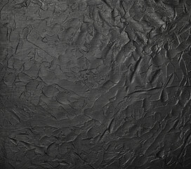 Black uneven grunge surface abstract background