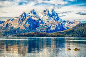 Aguila glacier, Patagonia, Chile, with rocks covered with mussels