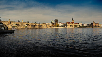 .stone old Charles bridge u from 1402 and vltava river in the center of prague at sunset in czech republic