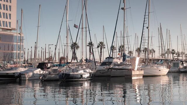 boats moored in the port of badalona, spain