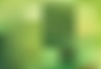 Light Green, Yellow vector blurred shine abstract background.