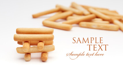 Freshly baked bread sticks isolated on a white background.
