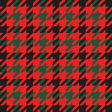 Goose foot. Christmas Pattern of crow's feet in red and green cage. Glen plaid. Houndstooth tartan tweed. Dogs tooth. Scottish checkered background. Seamless fabric texture. Vector illustration