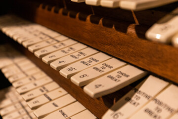 Pipe organ keyboard controls close up vintage style