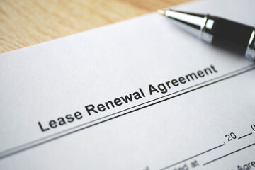 Legal document Lease Renewal Agreement on paper close up - obrazy, fototapety, plakaty