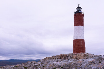 Fototapeta na wymiar lighthouse on the coast Ushuaia