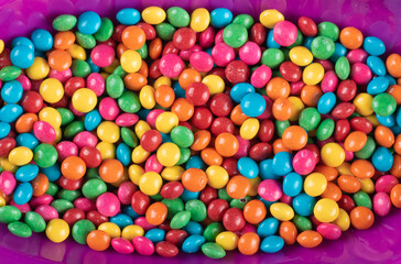 Fototapeta na wymiar Colorful Confetti candy background texture top view.