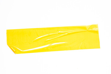 yellow tapes on white background. Torn horizontal and big size yellow sticky tape, adhesive pieces.