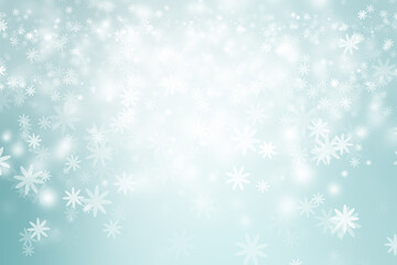 White Xmas Bokeh blur background. Circle light on blue backdrop. Snowflake abstract light wallpaper.