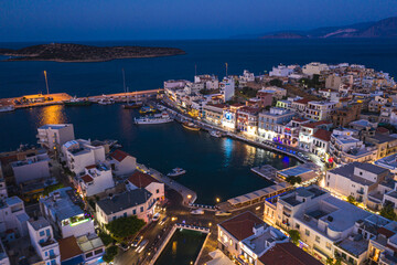 Night twilight panoramic view of Agios Nikolaos, Crete island, Greece