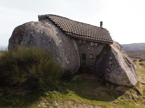 Casa do Penedo House museum built between two stone rocks boulders architectural monument near Fafe in Northern Portugal