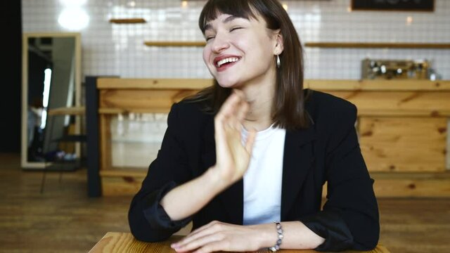 Young female candidate interviewed by employer. Portrait