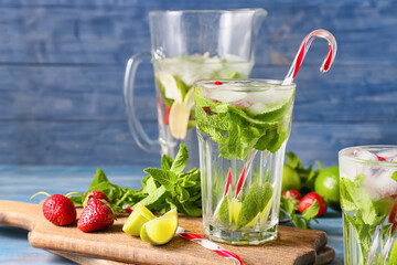 Jar of fresh strawberry mojito on table