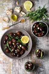 Pickled plums in a bowl. Fermentation of plums. Probiotics and fermented foods.