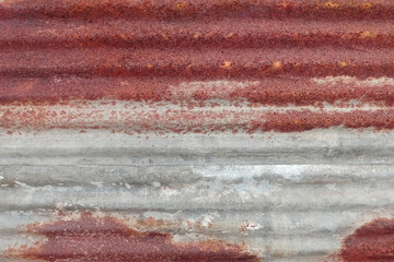 Wall rusty corrugated iron metal  texture or Background of old zinc and rust.