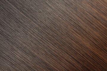 close up texture of single piece clip in straight black blended to brown two tone ombre style...