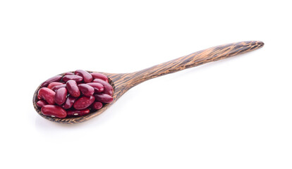 Red beans in wood spoon on white background
