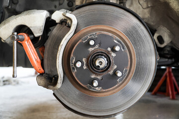 Maintenance of vehicle braking system at a service station
