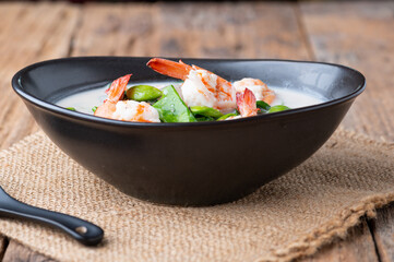 Phak Lieng Tom Kati Goong , Melindjo leaves in coconut milk soup with prawn