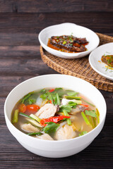 Thai Spicy chicken clear soup , tom yum kai,