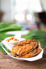Deep fried Fish and green mango salad