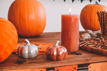 Halloween decoration with pumpkins and snacks