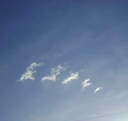 unusual clouds in the blue sky