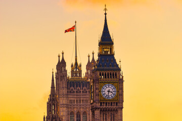 Big Ben clock tower in London with sunset sky