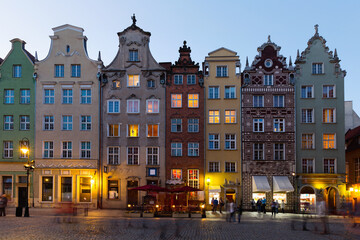 Fototapeta na wymiar Night view of lighted streets of Polish town of Gdansk