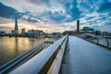 Sunrise panorama of London seen from Millennium bridge 