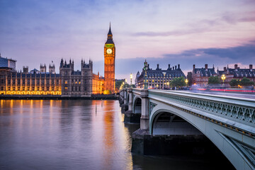 Elizabeth tower known as Big Ben clock and Westminster bridge at sunset