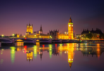 Fototapeta na wymiar Big Ben and Westminster with reflection at night in London. England