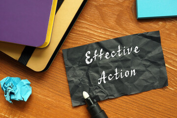 Business concept about Effective Action with inscription on the page.