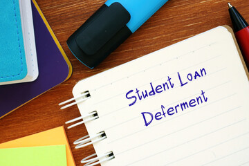 Business concept meaning Student Loan Deferment with sign on the piece of paper.