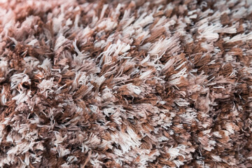 Surface Texture of New Carpet Clean Soft Warm Fluffy Long Pile Background Brown Coffee Color from Textile Close up for Floor